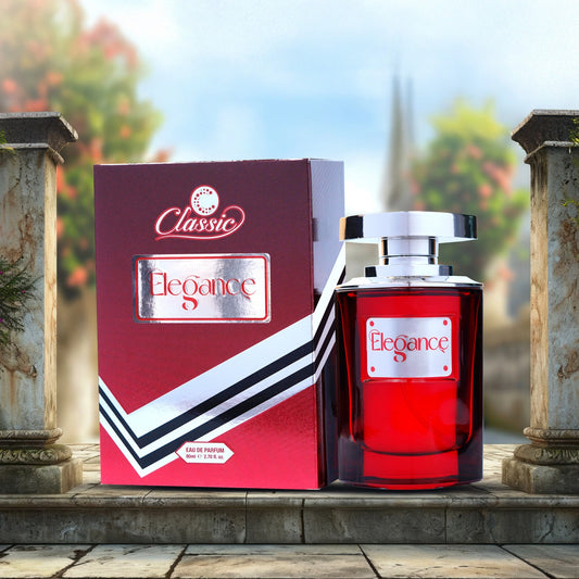 Classic Elegance Perfume 100ml red bottle with box design placed outdoors.